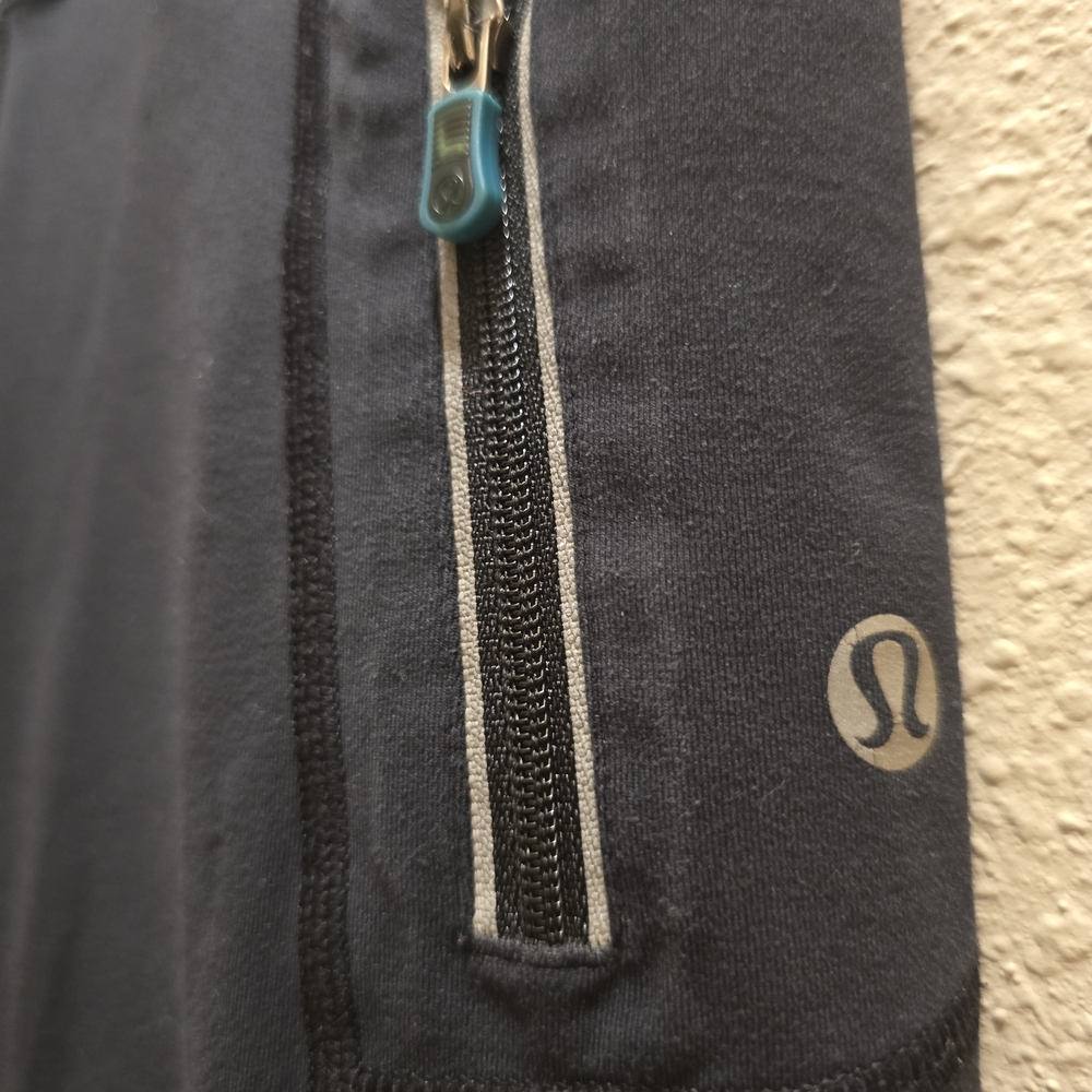 lululemon athletica Black and Teal Leggings - Picture 1 of 5